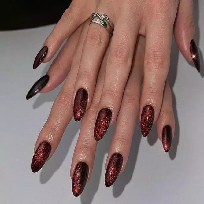 Gitter with charming Burgundy Nails