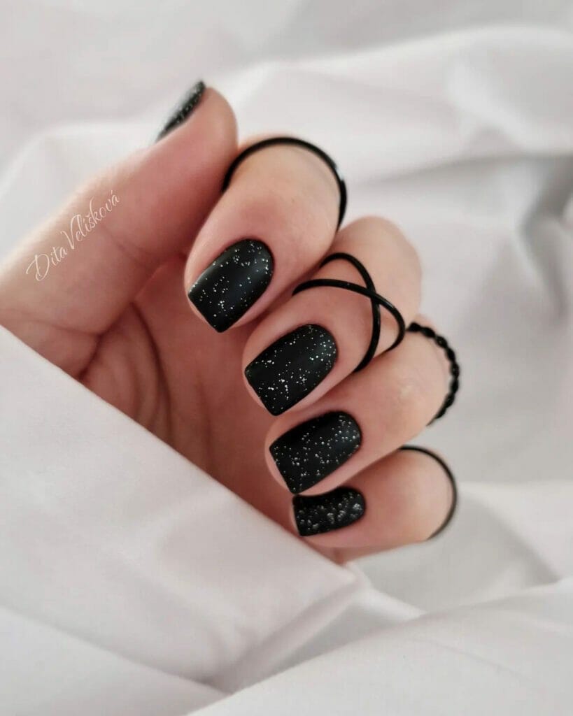 black-nails-with-silver-glitter