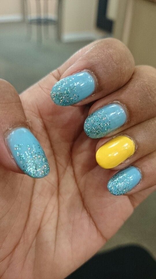 Glitter Dust blue and yellow nails