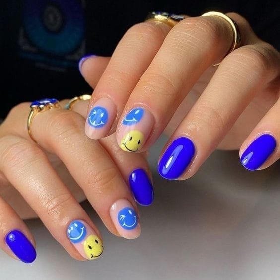 cute Smiley face Blue and Yellow nails