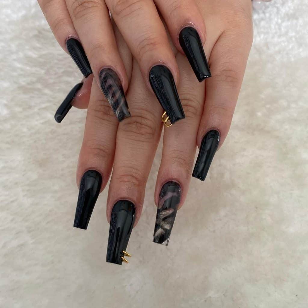 Black Marble Nails with Piercings
