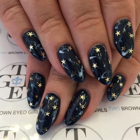 Black Marble with Starry Accent nails