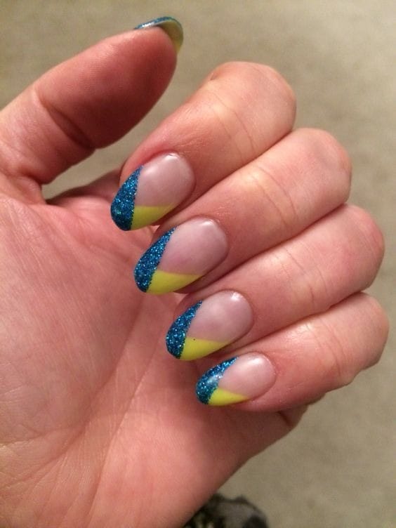 Glitter blue and yellow tips nails