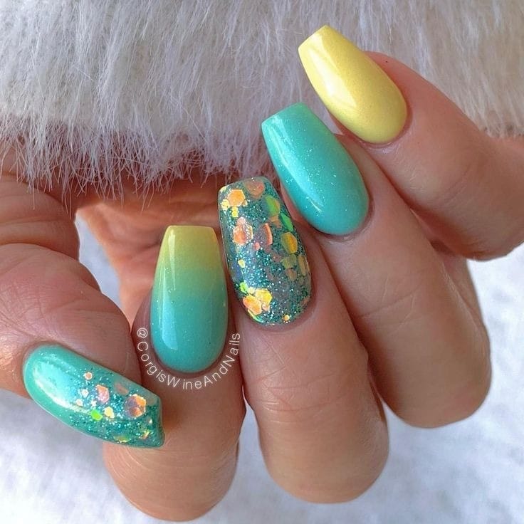Glimmering Glitter blue and yellow nails