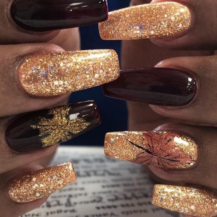 Dark Brown fall Nails With gold glitter 